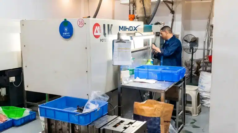 Professional injection molding machine at MIHOX factory for high-detail custom figure manufacturing and mass production