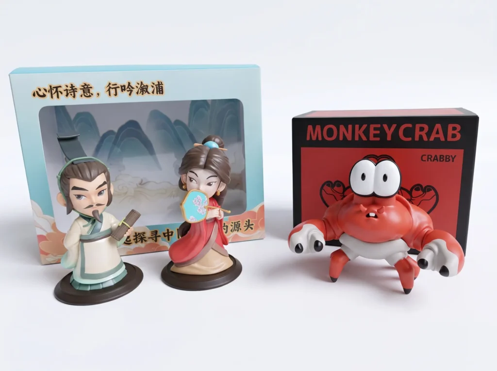 Physical comparison of art toys: detailed injection-molded figures with sharp edges on the left, and a rounded slush-cast soft vinyl toy on the right.